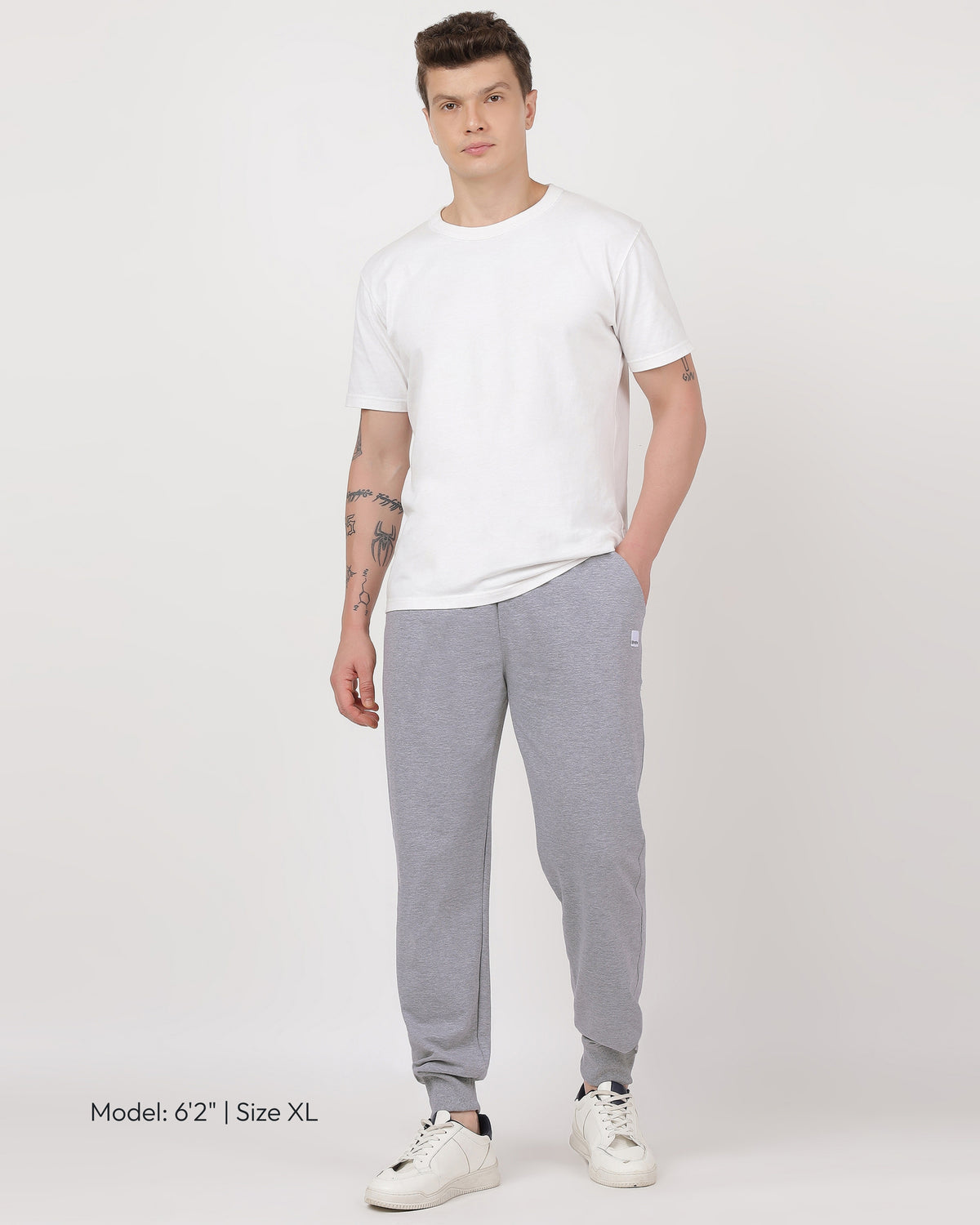 Model wearing Brethe Free_Form_Jogger in Heather Grey full front view.