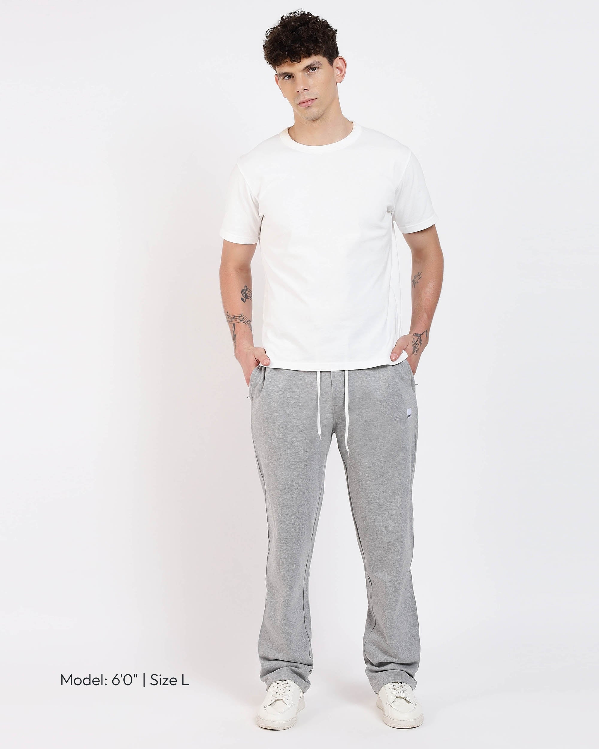 Model wearing Brethe Soft-Structured Pant in Heather Grey full front view.