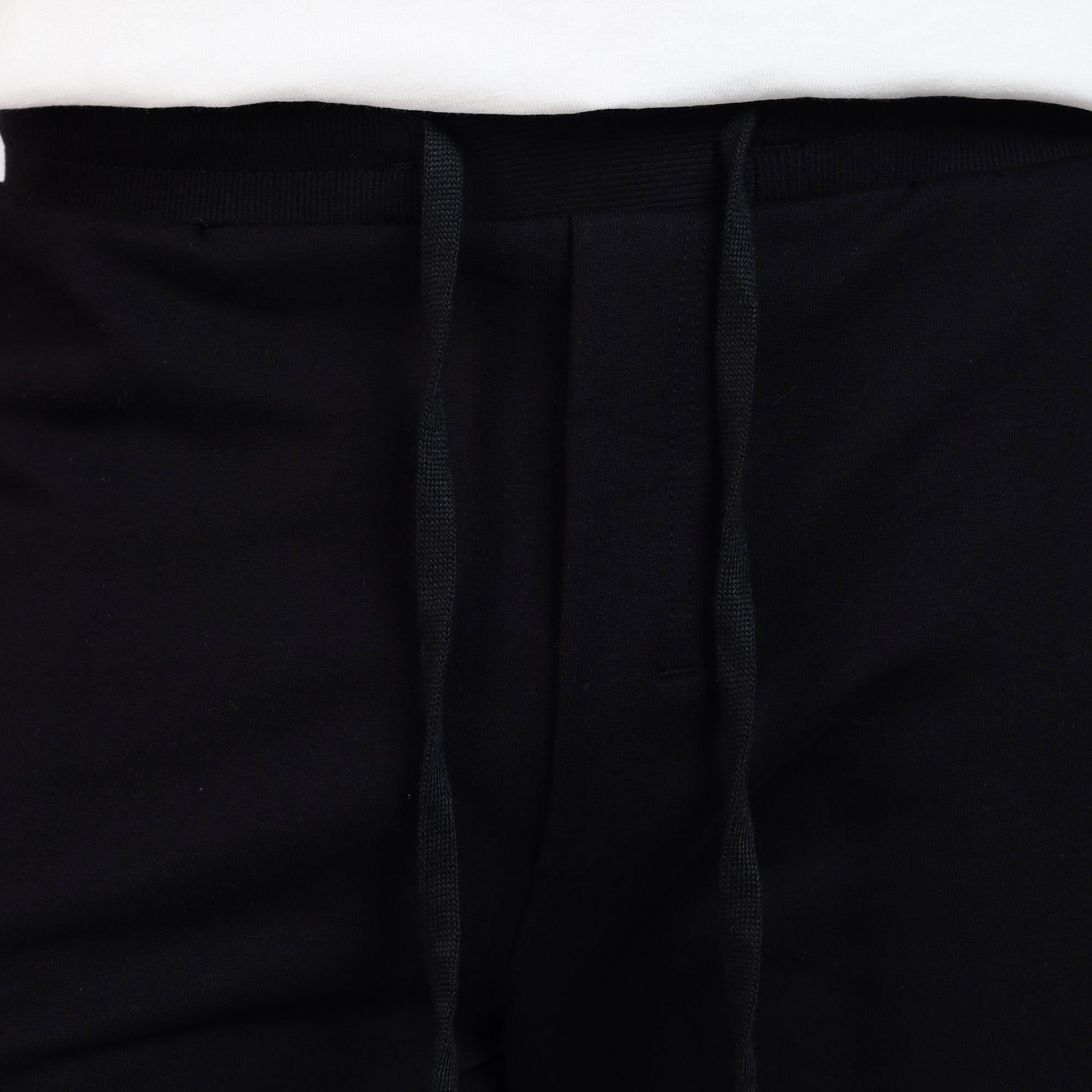 Brethe soft structured pant in Black close-up showing ribbed waistband and drawstrings.